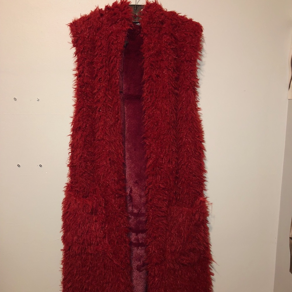 Shaggy maroon long faux fur vest